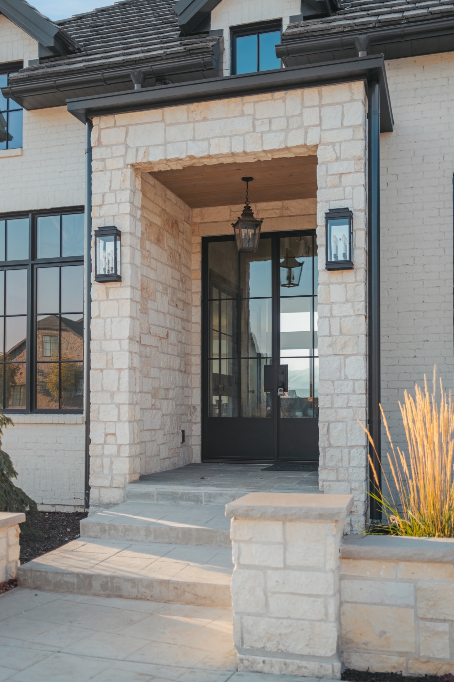 Entry of a Timber Creek custom home at dusk